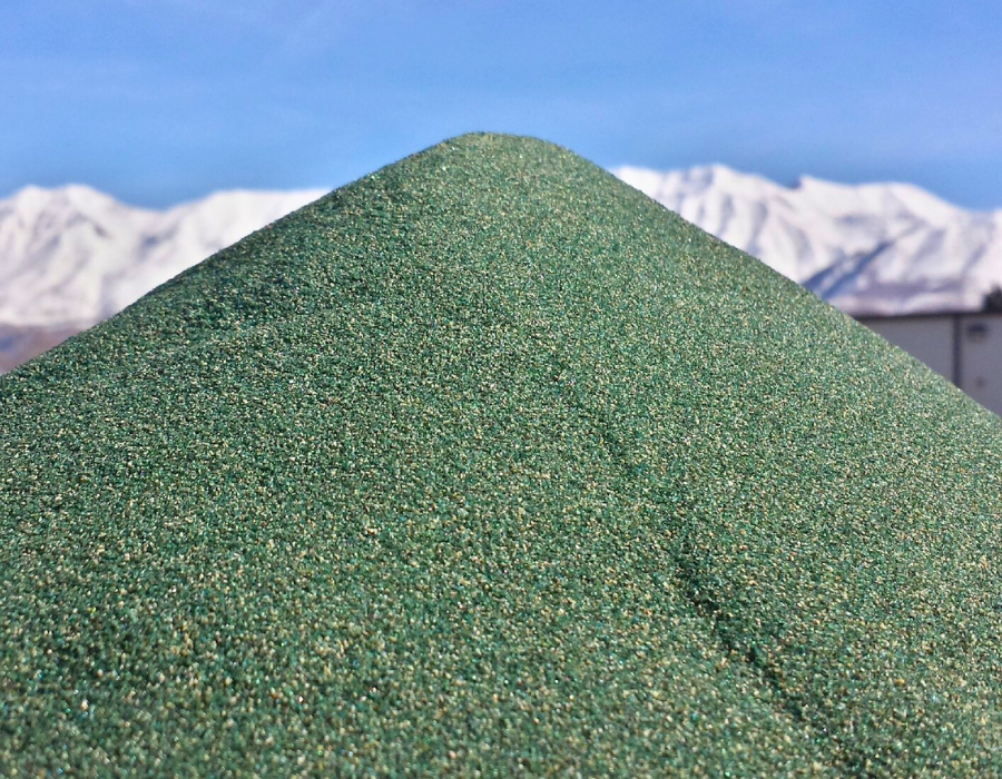 A pile of Green Diamond Performance Materials Green Diamond Sand